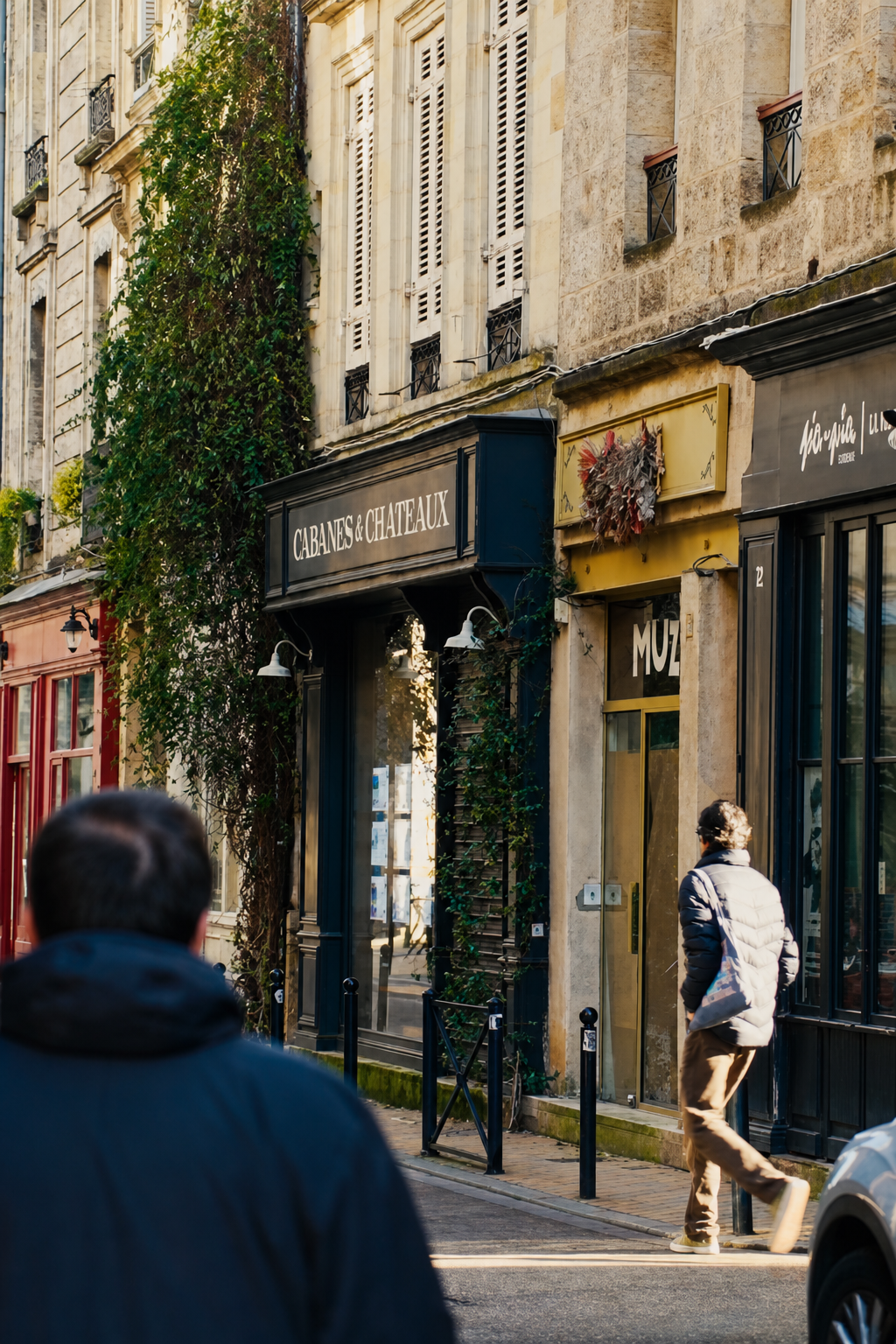 Narrow street of tall shuttered houses in the Chartrons district of Bordeaux
